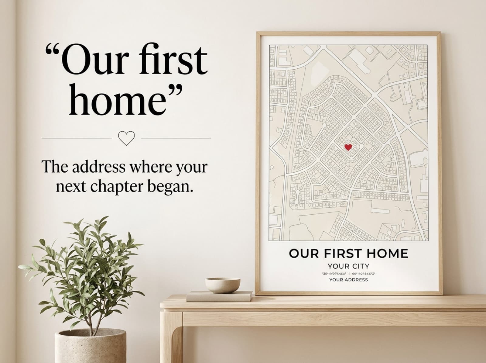 First-home map gift concept in a light wood frame on a console